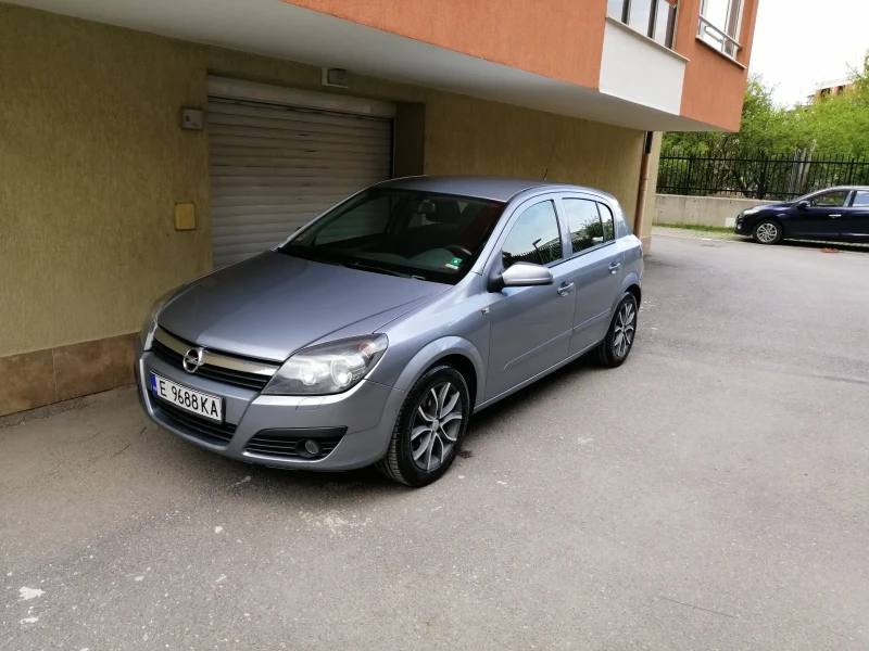 Opel Astra, снимка 13 - Автомобили и джипове - 53087335