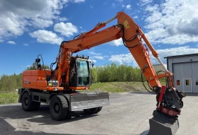 Багер DOOSAN 140W, снимка 1