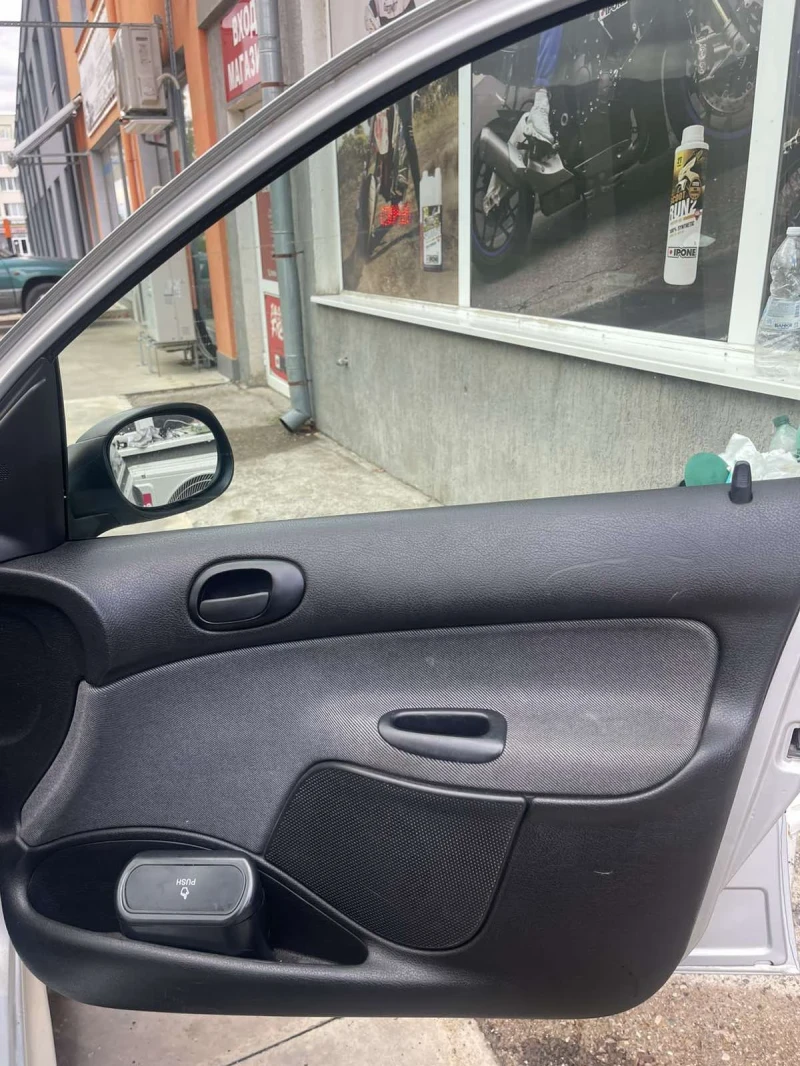 Peugeot 206, снимка 11 - Автомобили и джипове - 52437988