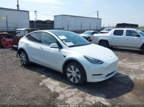 ������ Tesla Model Y