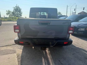 Jeep Gladiator Sport S  CARFAX | Auto.bg — изображение 14