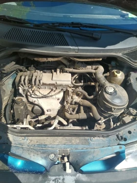 Renault Scenic 1.6 8v 90коня газ, снимка 10