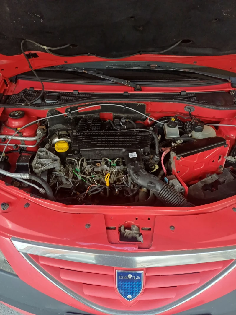 Dacia Logan 1.5dci, снимка 9 - Автомобили и джипове - 53046558