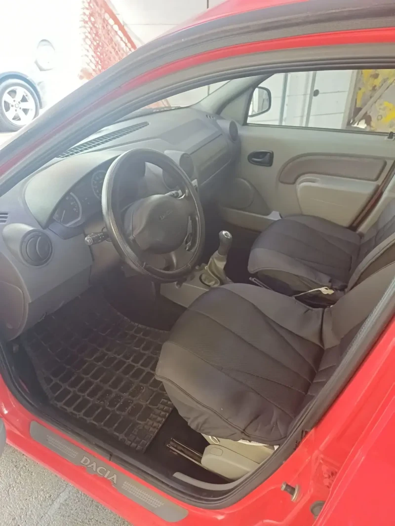 Dacia Logan 1.5dci, снимка 5 - Автомобили и джипове - 53046558