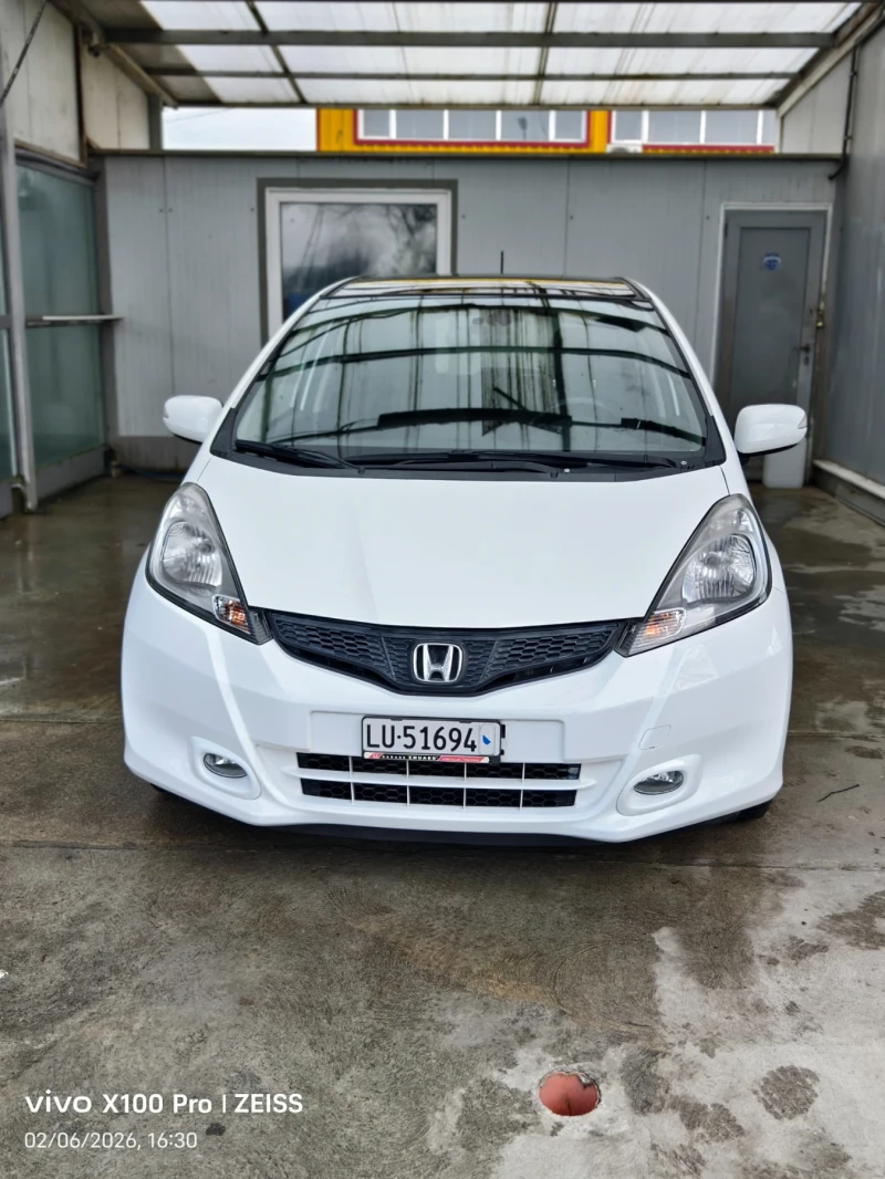 Honda Jazz 1.4i Swiss Excl.Aut., снимка 12 - Автомобили и джипове - 53291986