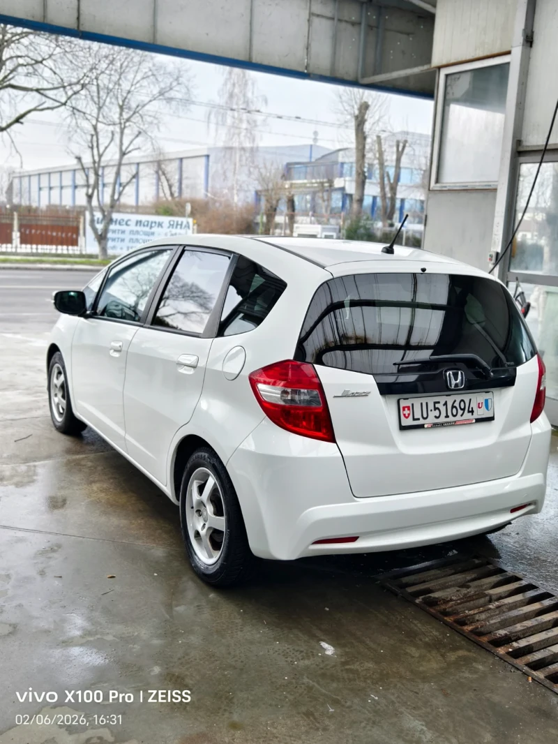 Honda Jazz 1.4i Swiss Excl.Aut., снимка 14 - Автомобили и джипове - 53291986