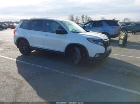 ������ Honda Passport
