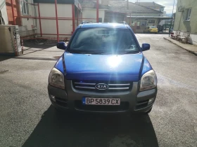 Kia Sportage - 2000 € / 3911.66 лв. - 58468139 11