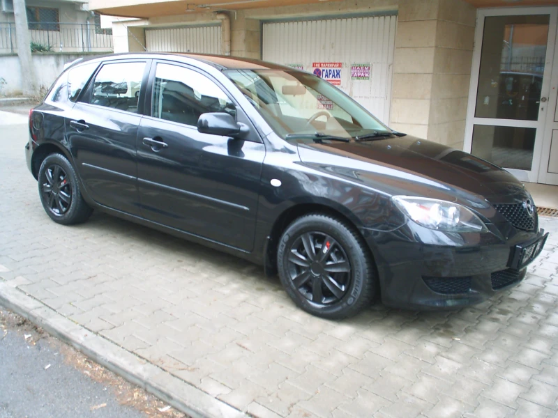 Mazda 3 1.6 16V Automat, снимка 17 - Автомобили и джипове - 53213105