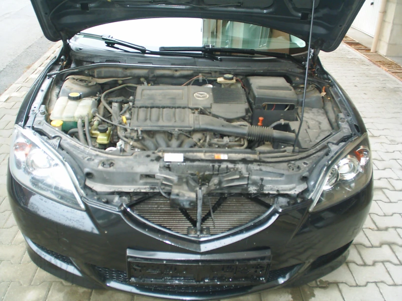 Mazda 3 1.6 16V Automat, снимка 16 - Автомобили и джипове - 53213105