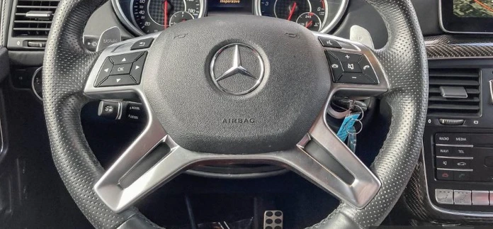 Mercedes-Benz G * AMG 63 * CARFAX * БЕЗ ПЪРВОНАЧАЛНА ВНОСКА, снимка 6 - Автомобили и джипове - 52882680