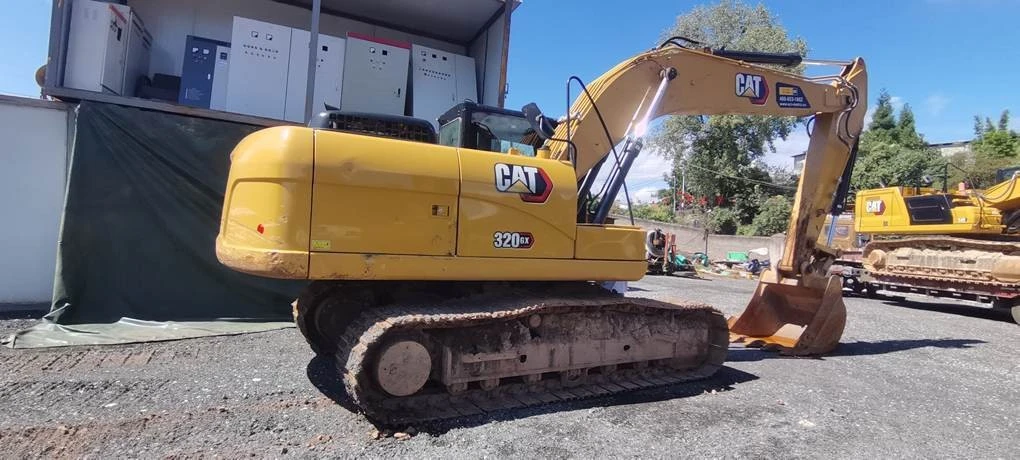 Багер Cat 320GX