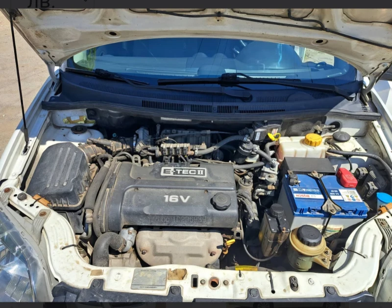 Chevrolet Aveo, снимка 10 - Автомобили и джипове - 52310836