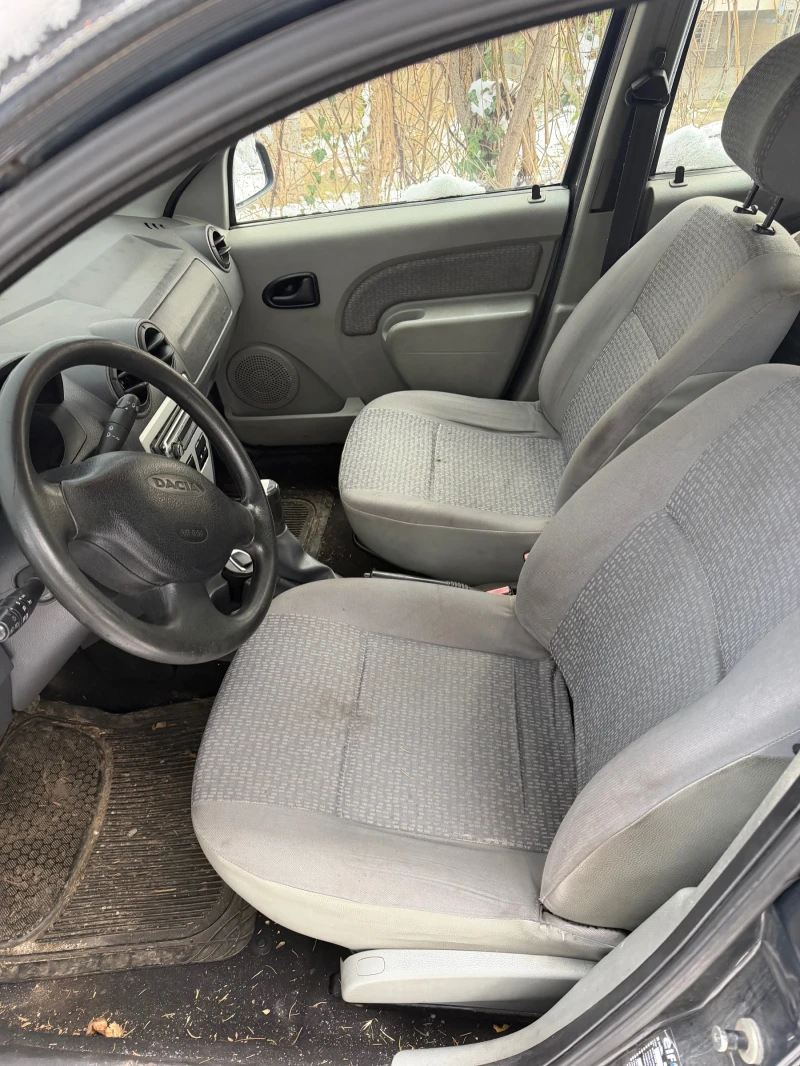 Dacia Logan, снимка 11 - Автомобили и джипове - 53361534
