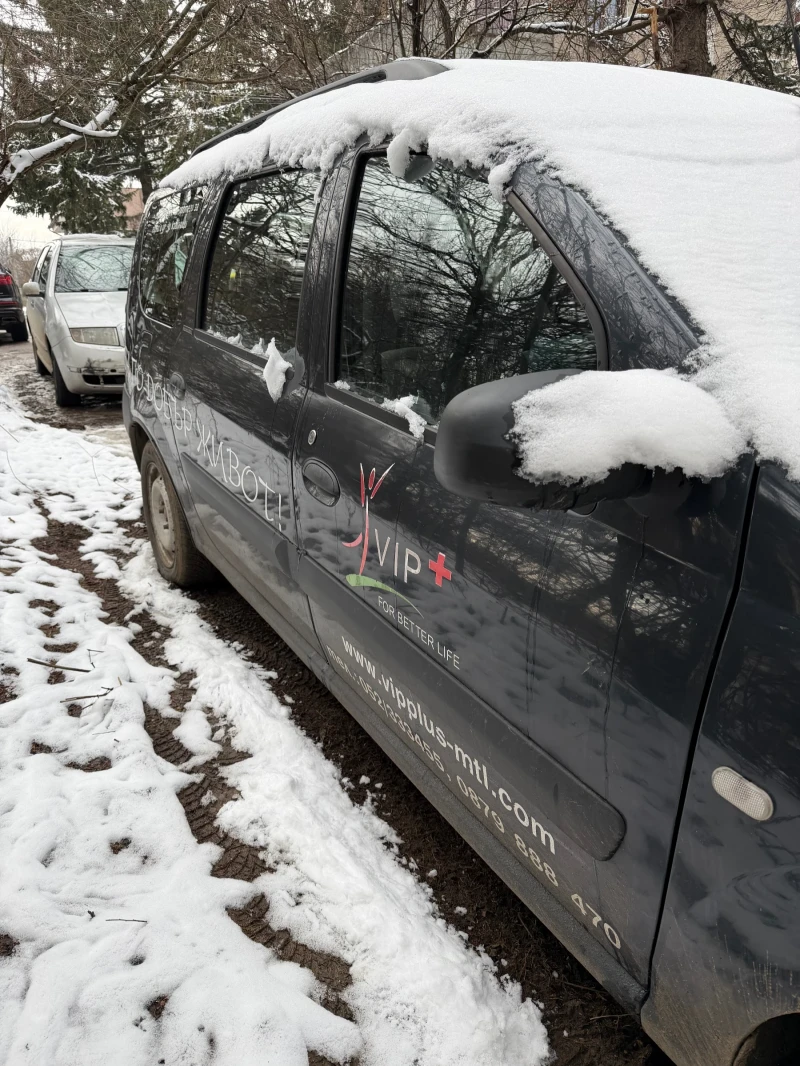 Dacia Logan, снимка 8 - Автомобили и джипове - 53361534