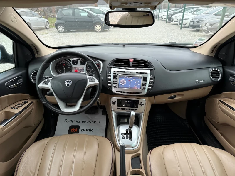 Lancia Delta 1.6 Jtd Панорама Кожа Нави, снимка 13 - Автомобили и джипове - 53507982
