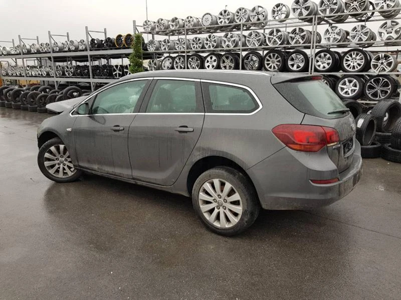 Opel Astra 1.7.2.0-BI TURBO, снимка 4 - Автомобили и джипове - 18564784