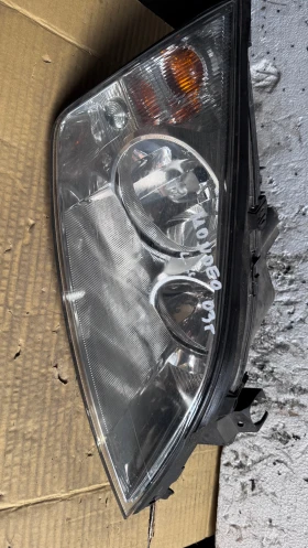       a Ford Mondeo - 1305239177 / 0301174202