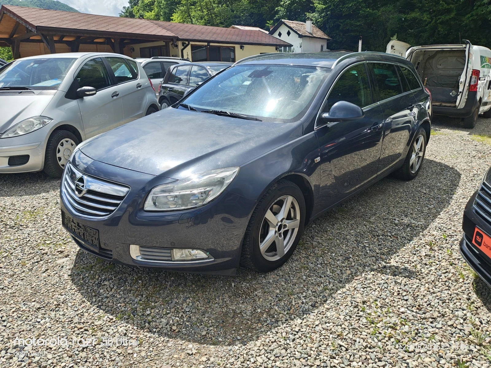 Opel Insignia 131k.c. 2.0 CDTi Sport Tourer SW , снимка 12 - Автомобили и джипове - 54702778