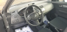 Suzuki Swift 1.3i ВНОС ИТАЛИЯ БЕЗ РЪЖДИ И ЗАБЕЛЕЖКИ 138000км., снимка 10