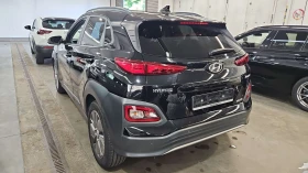Hyundai Kona PREMIUM 64KWh FULL ASSIST/HEADUP/DISSTR/SOH100% | Mobile.bg    3