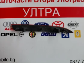 13262017 Ляв светлоотразител за броня  Opel Astra J 13262017, снимка 2 - Части - 53593336