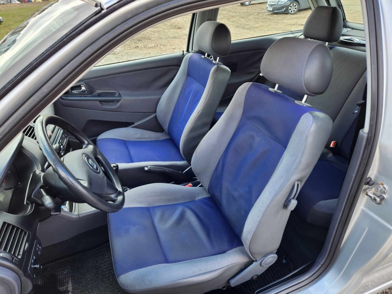 Seat Ibiza 1.4, снимка 11 - Автомобили и джипове - 44668442