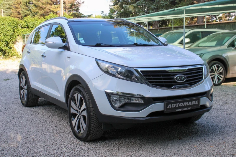 Kia Sportage 2.0CRDI 4X4 PREMIUM, снимка 7 - Автомобили и джипове - 51024907