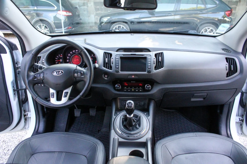 Kia Sportage 2.0CRDI 4X4 PREMIUM, снимка 11 - Автомобили и джипове - 51024907