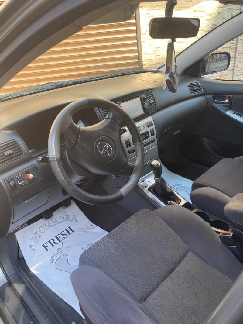 Toyota Corolla 2.0 D-4D 90кс, снимка 11 - Автомобили и джипове - 49161748