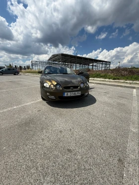 ������ Hyundai Coupe