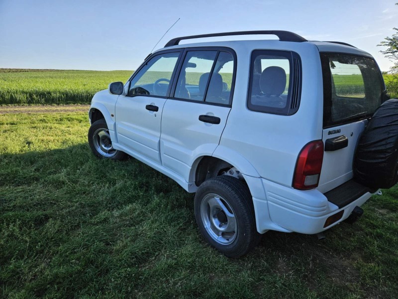 Suzuki Grand vitara, снимка 14 - Автомобили и джипове - 46393026