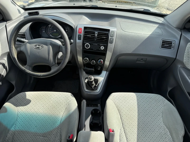 Hyundai Tucson 2.0CRDi 4x4, снимка 8 - Автомобили и джипове - 50554329