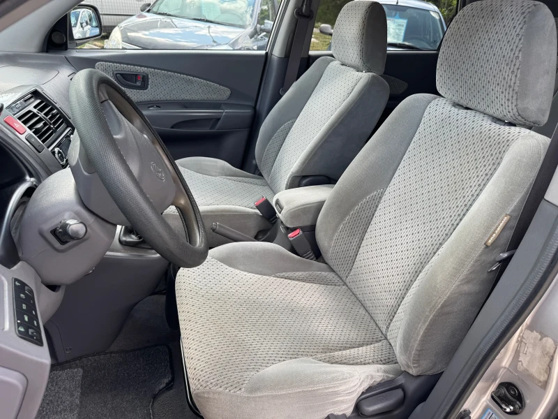 Hyundai Tucson 2.0CRDi 4x4, снимка 7 - Автомобили и джипове - 50554329