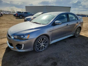 ������ Mitsubishi Lancer