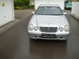      ,   Mercedes-Benz E 220