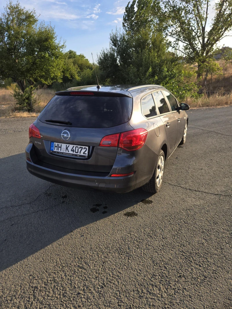 Opel Astra J 1.3CDTI , снимка 7 - Автомобили и джипове - 52378132