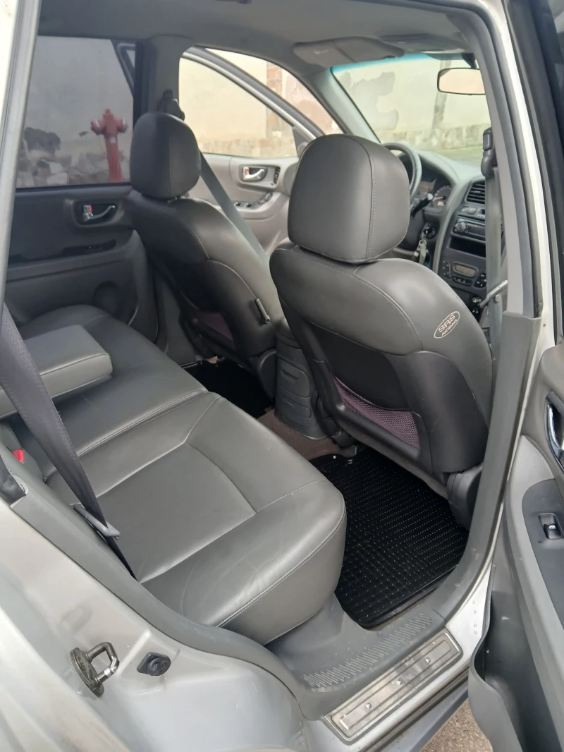 Hyundai Santa fe 2.4i DOCH РЕГИСТРИРАН ДОКАРАН НА СОБСТВЕН ХОД , снимка 10 - Автомобили и джипове - 53052237