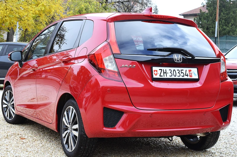 Honda Jazz 1.3ШВЕЙЦАРИЯ/КЛИМАТРОНИК/Keyles/Халогени/Осова/Лед, снимка 6 - Автомобили и джипове - 50785196