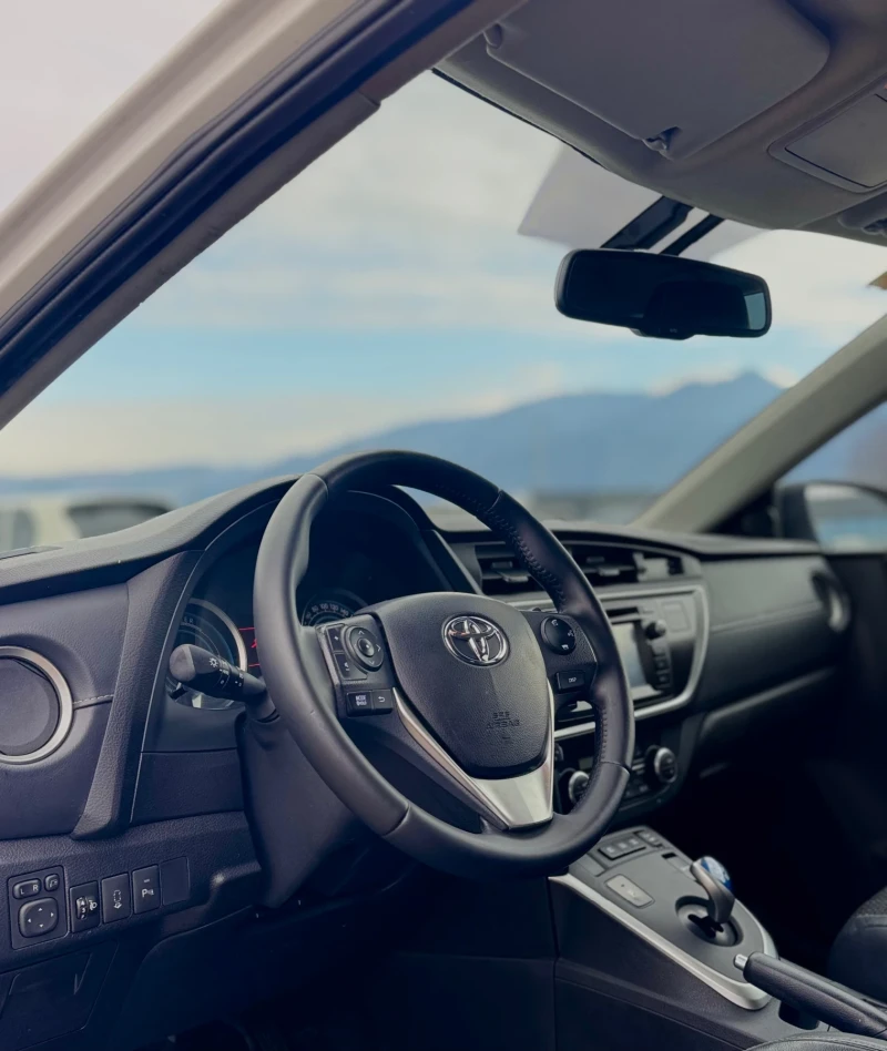 Toyota Auris 1.8i Hibrid/Navi/Camera/Euro5B, снимка 11 - Автомобили и джипове - 53433223