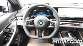 BMW i5, снимка 13