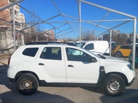 Dacia Duster 1.6 SCe 4x4 - [9] 