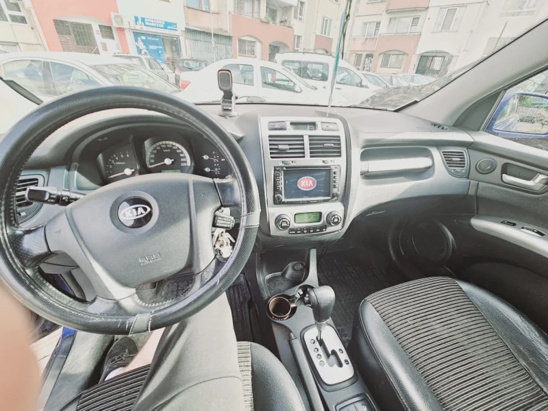 Kia Sportage, снимка 6 - Автомобили и джипове - 47858754