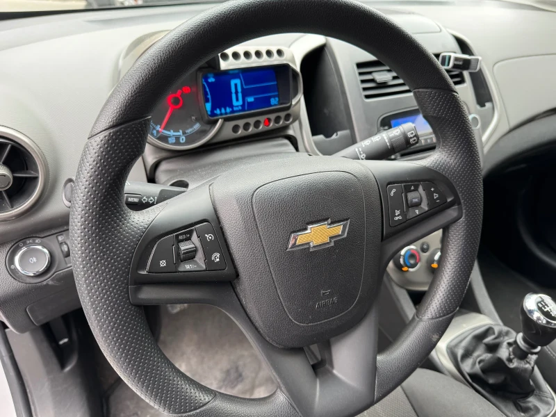 Chevrolet Aveo 1.3CDTI ДОСТА ЗАПАЗЕНА, снимка 13 - Автомобили и джипове - 47841570