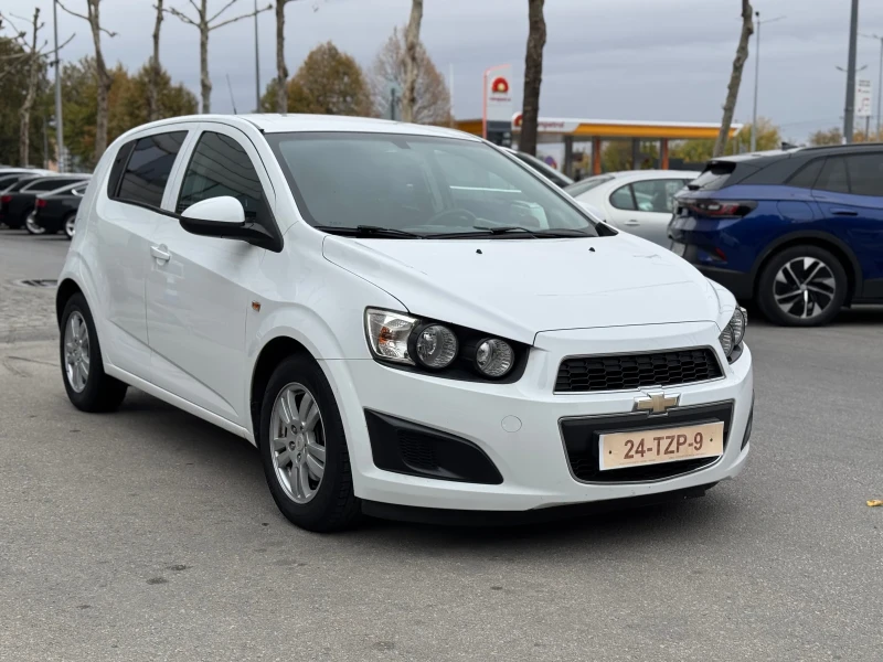 Chevrolet Aveo 1.3CDTI ДОСТА ЗАПАЗЕНА, снимка 2 - Автомобили и джипове - 47841570