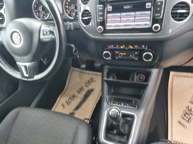VW Tiguan 1.4TSi BLUEMOTION, снимка 9 - Автомобили и джипове - 52352381