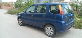 Suzuki Ignis 1.3i/4x4/, снимка 7 - Автомобили и джипове - 35998326