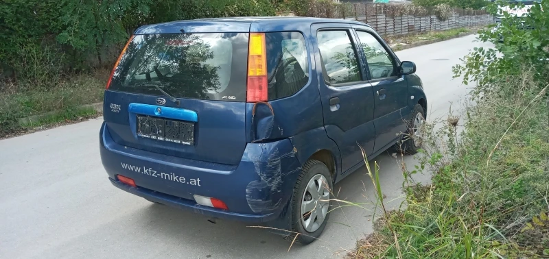 Suzuki Ignis 1.3i/4x4/, снимка 4 - Автомобили и джипове - 35998326