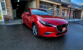 ������ Mazda 3