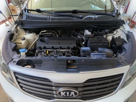 Kia Sportage 2.0i Automatic  - 10780 € / 21083.85 лв. - 17000060 14